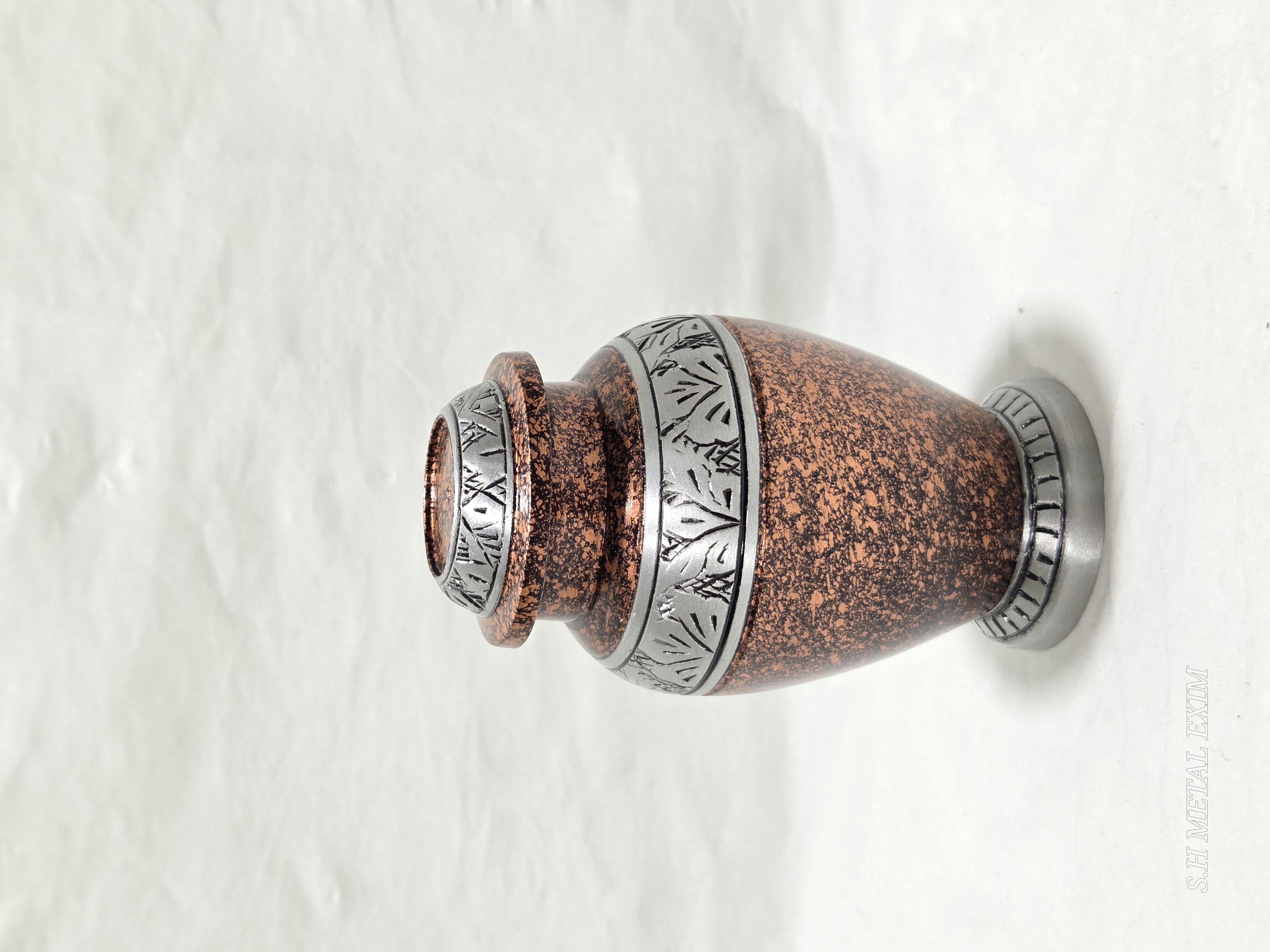 Elegance in Memory: The Copper Patina Urn