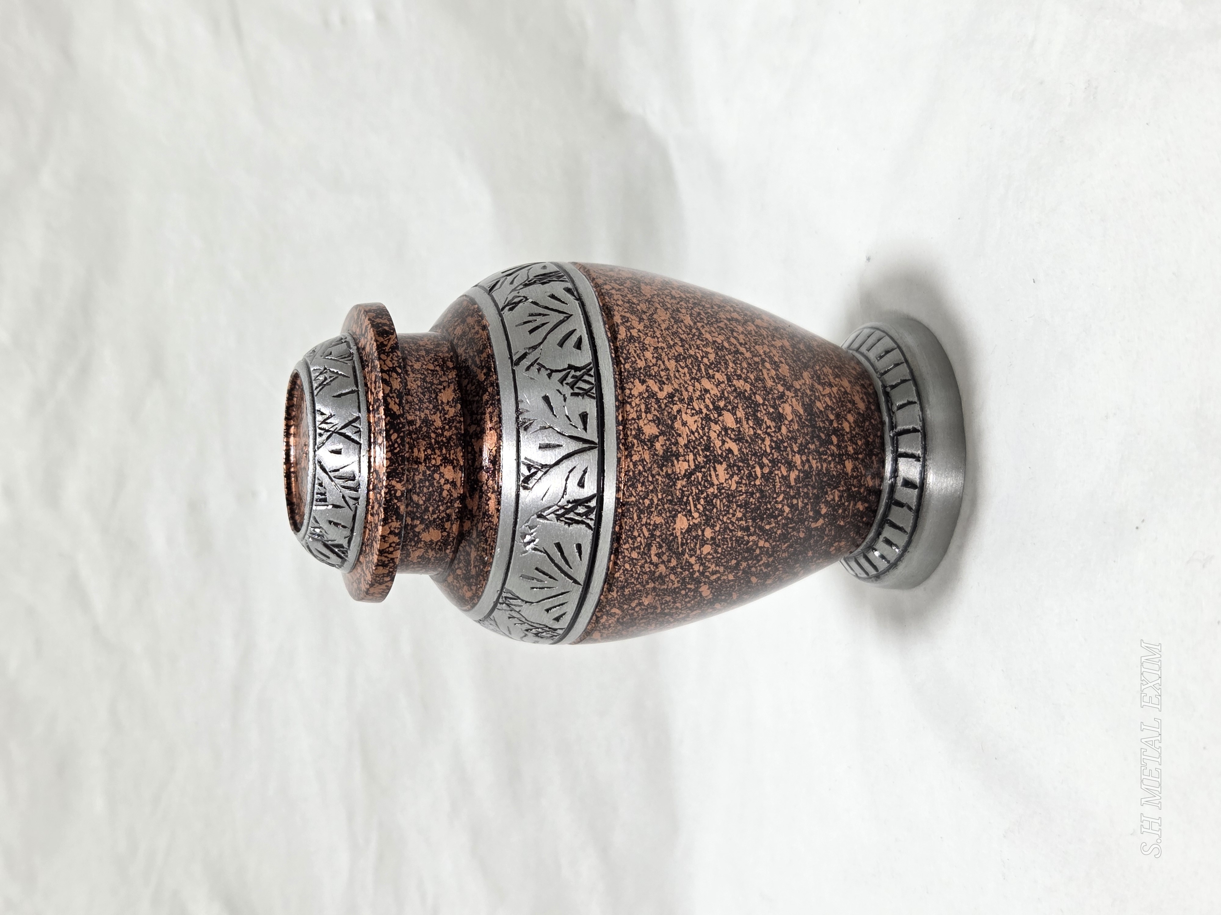 Elegance in Memory: The Copper Patina Urn