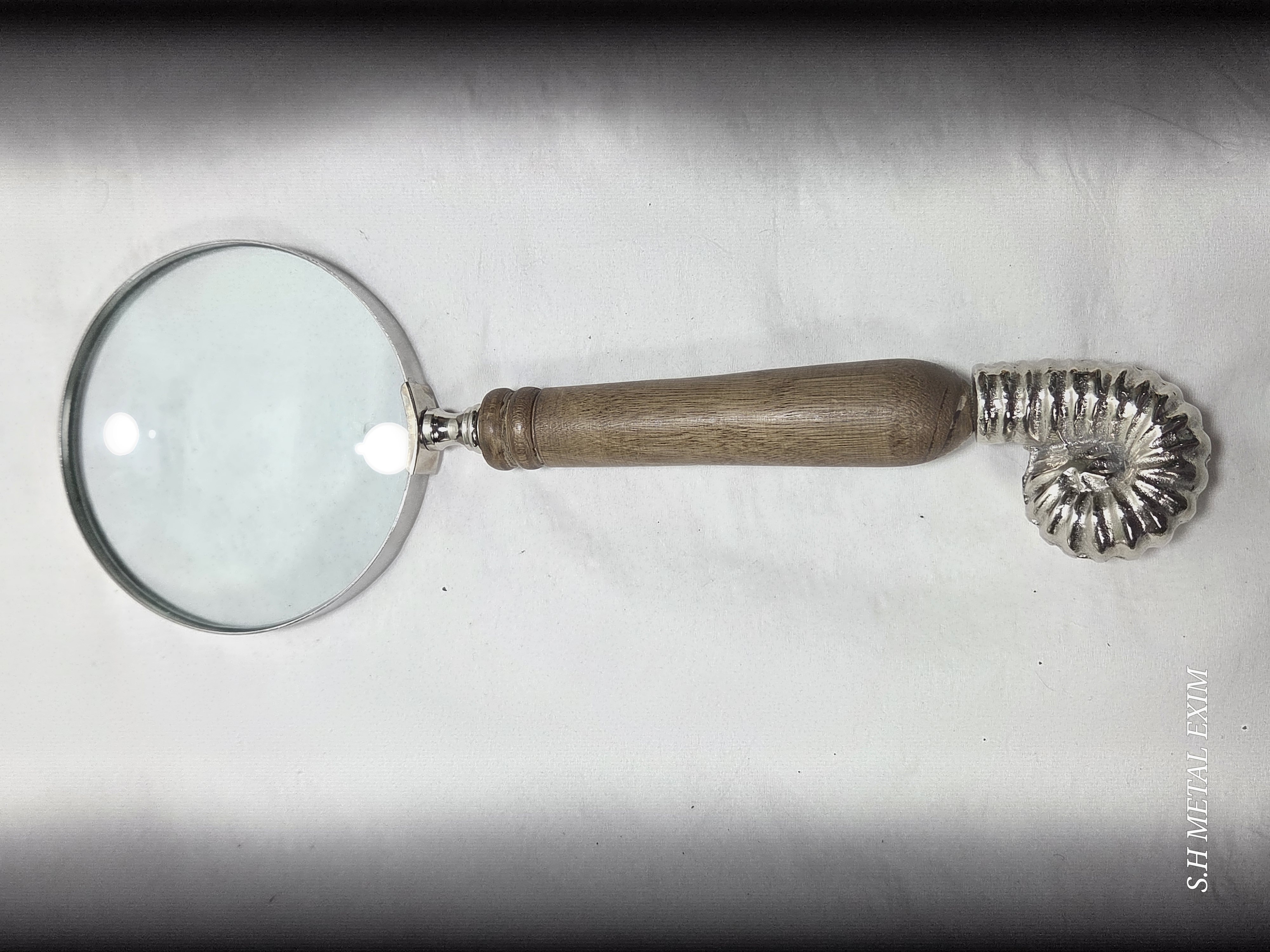 The Nautilus Explorer: Handcrafted Wood and Silver Ammonite Magnifying Glass