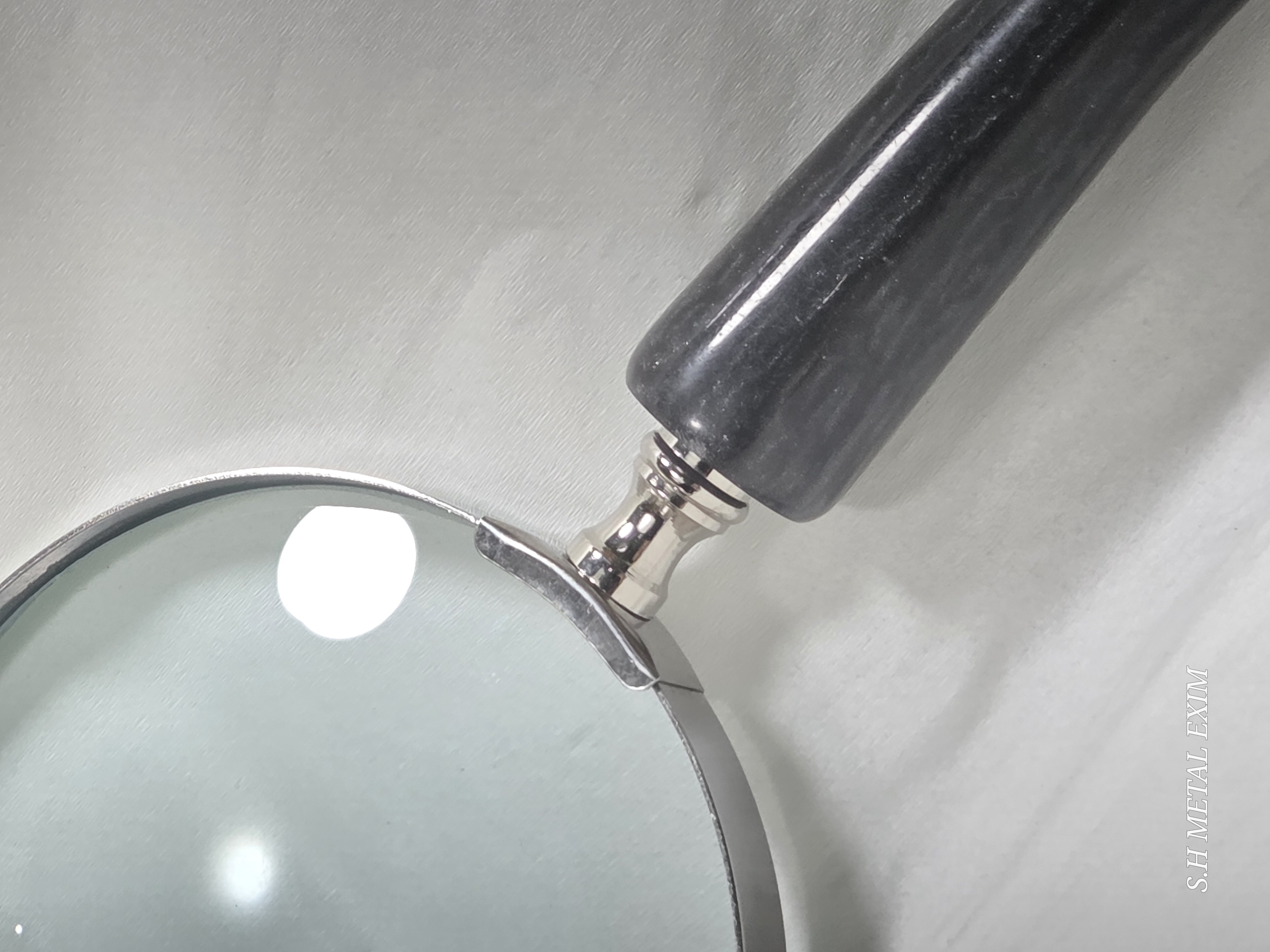The Seeker’s slim horn magnifying glass.