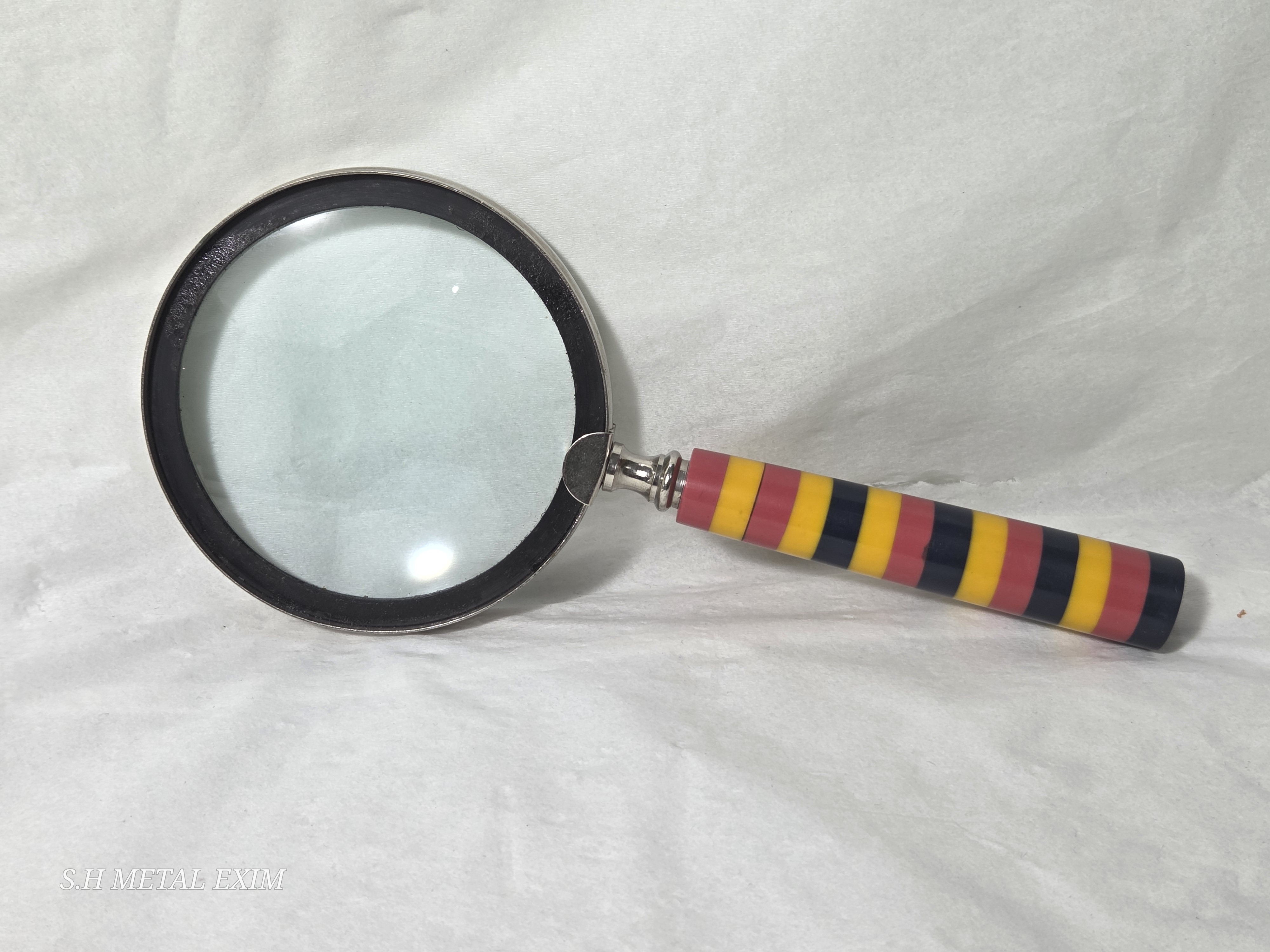 A World of Wonders: The Explorer’s Gilded Atlas and Tricolor Magnifier