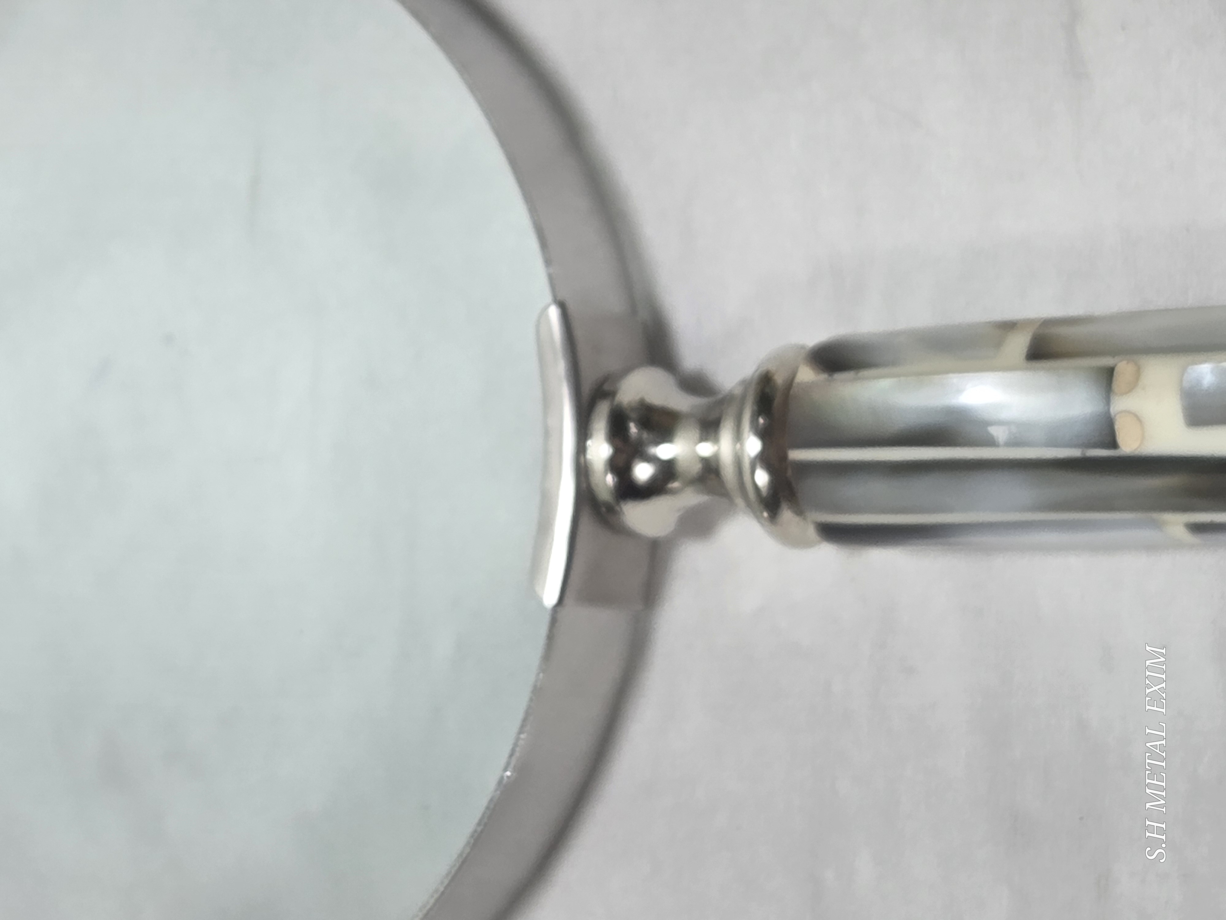 A curated collection of vintage curiosities magnifying glass.