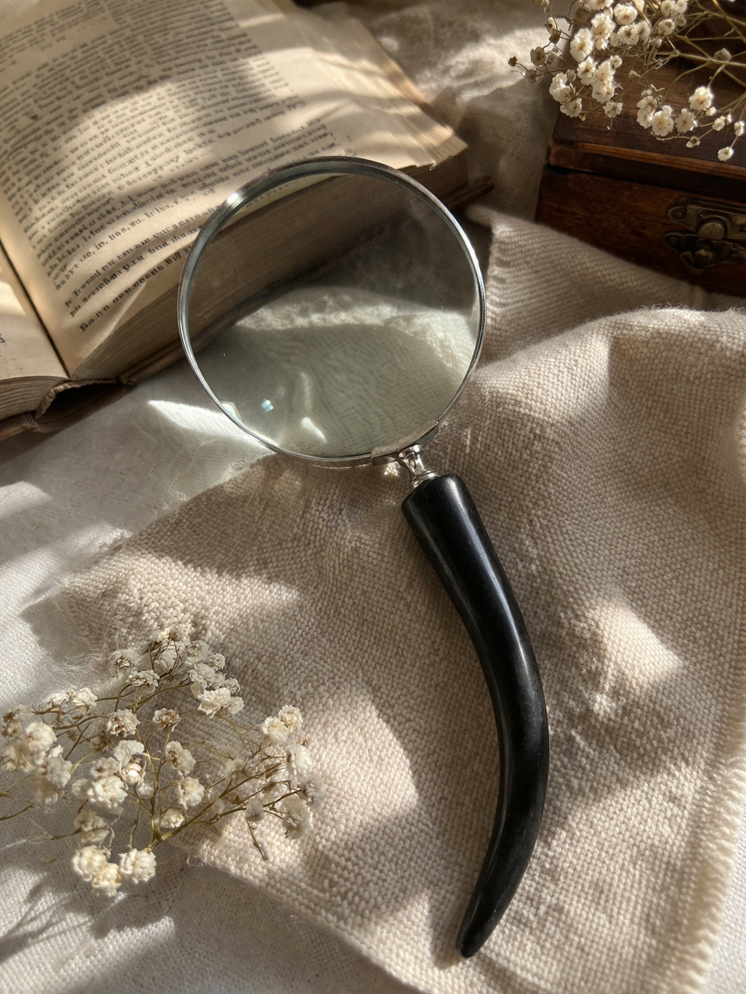 The Seeker’s slim horn magnifying glass.