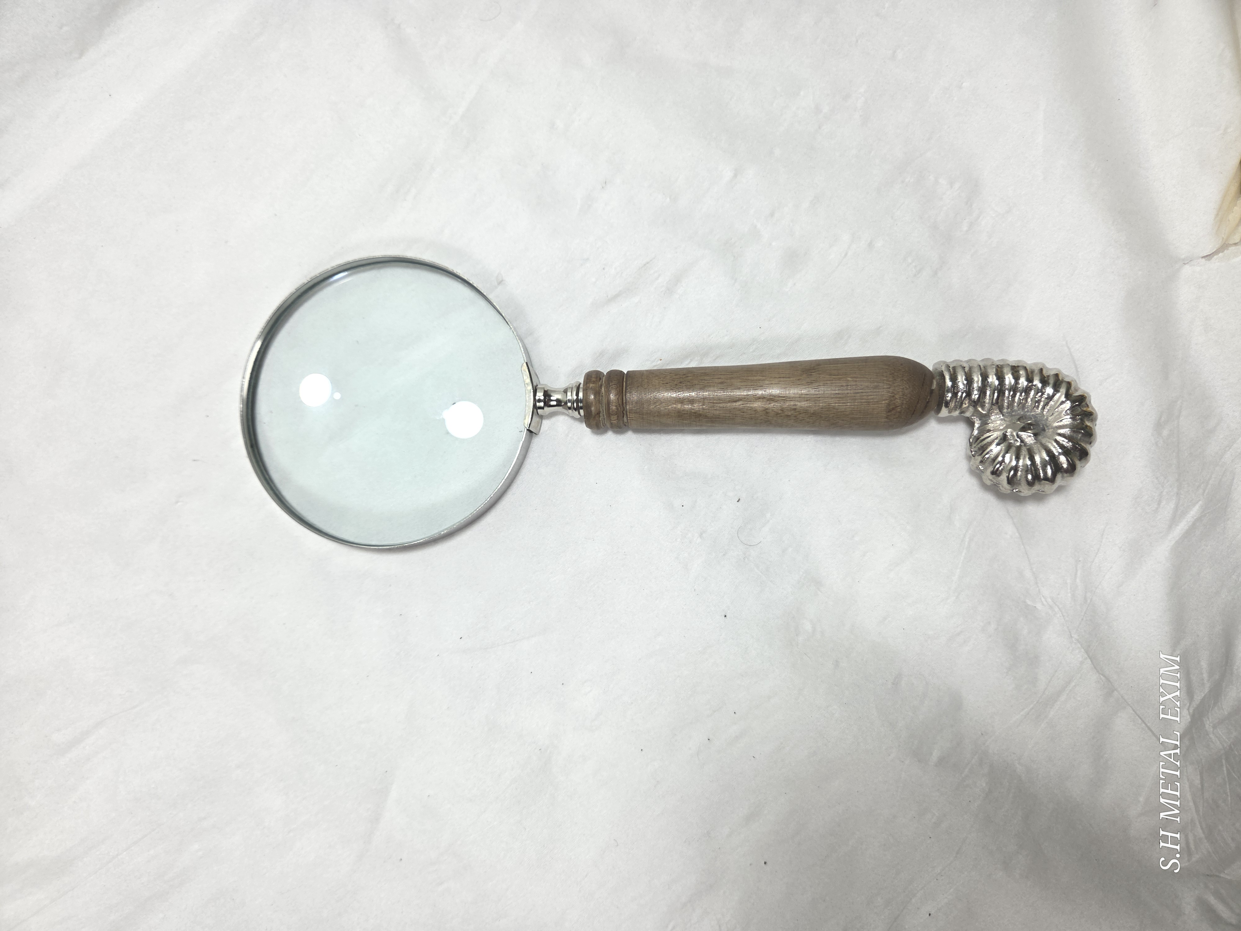The Nautilus Explorer: Handcrafted Wood and Silver Ammonite Magnifying Glass