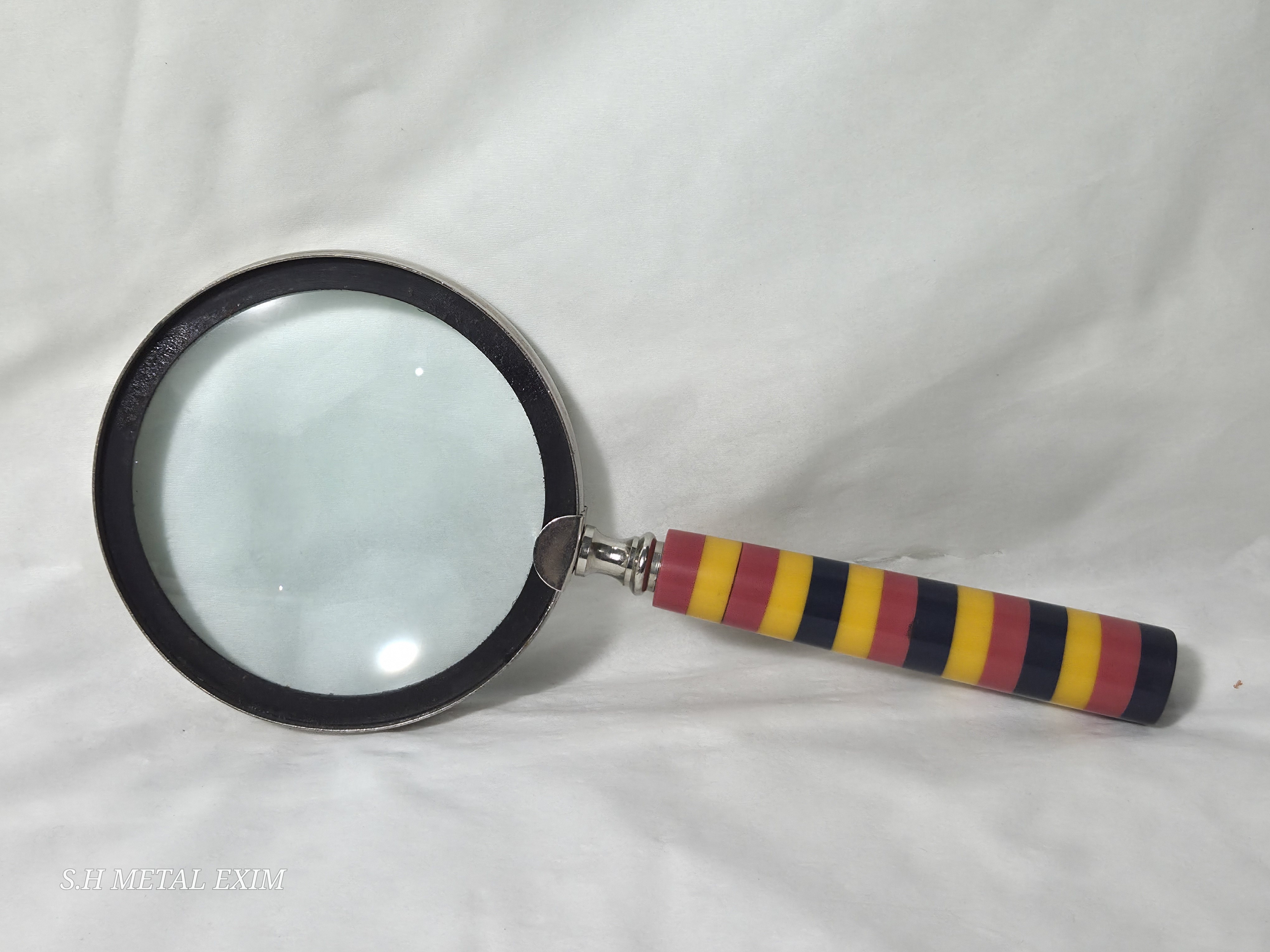 A World of Wonders: The Explorer’s Gilded Atlas and Tricolor Magnifier