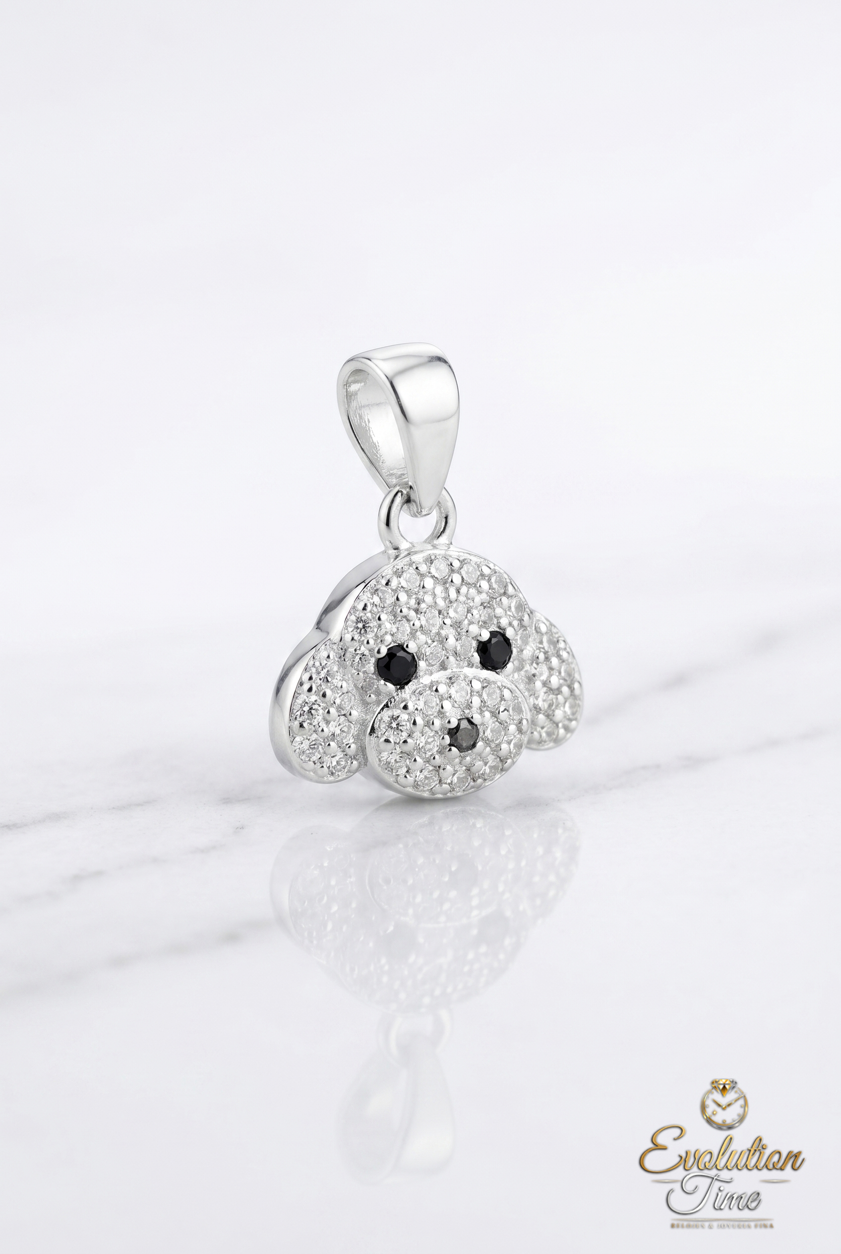 Dije de perrito en plata