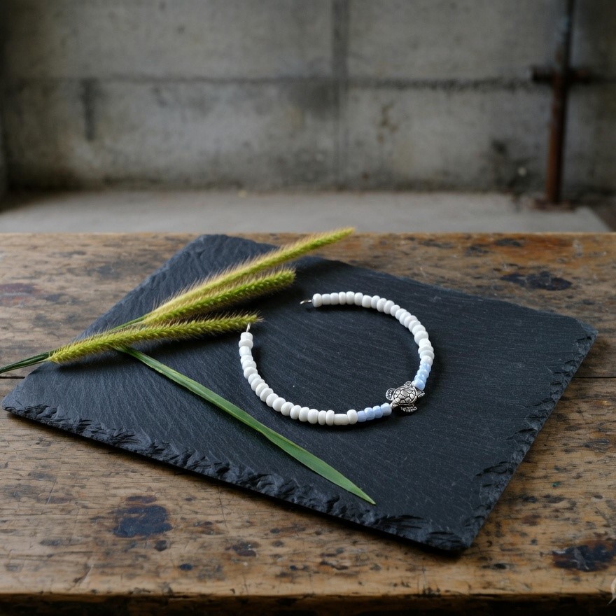 Bracelet with Turtle charm and pastel blue and white beads - beach themed