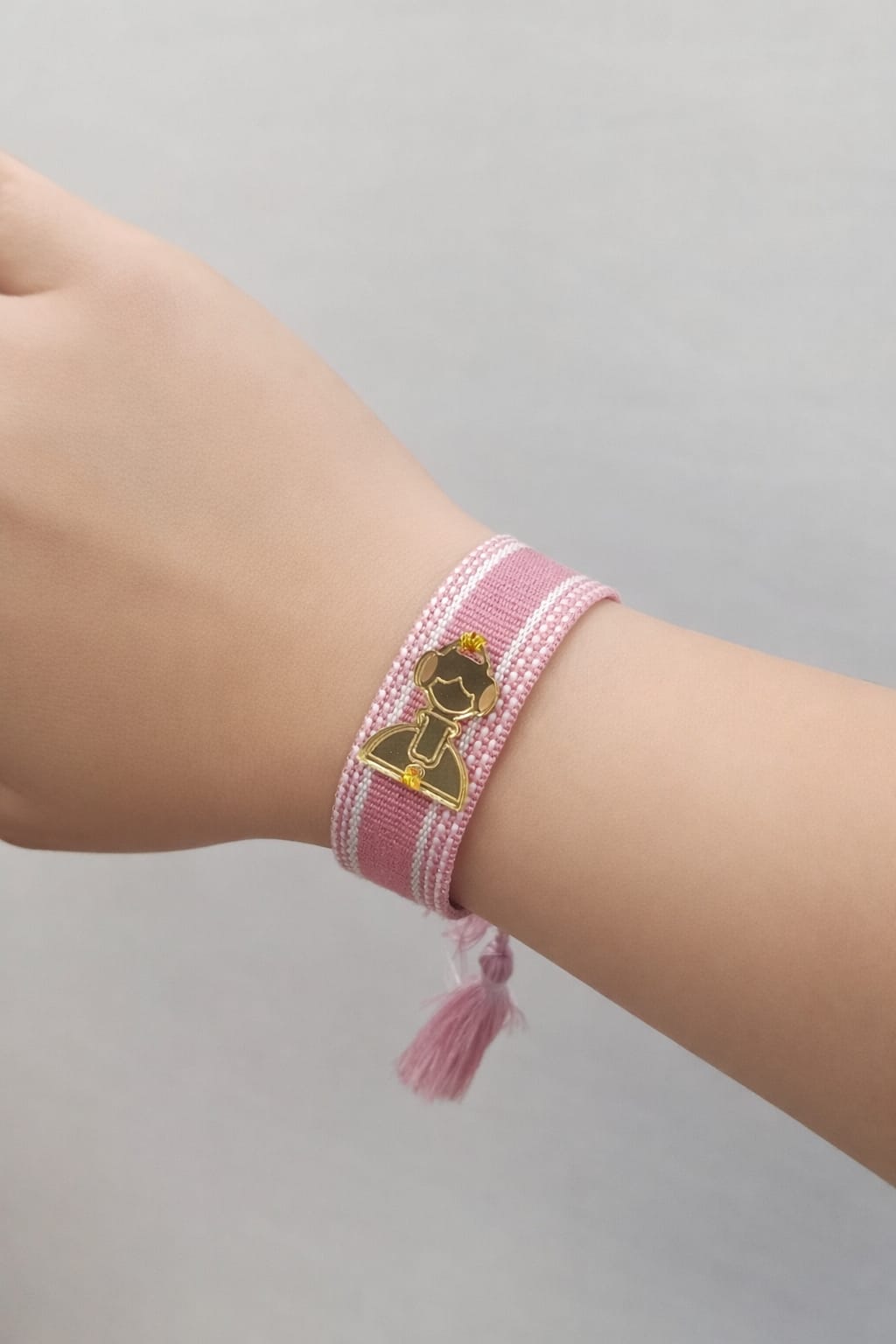 Pulsera tejida rosa