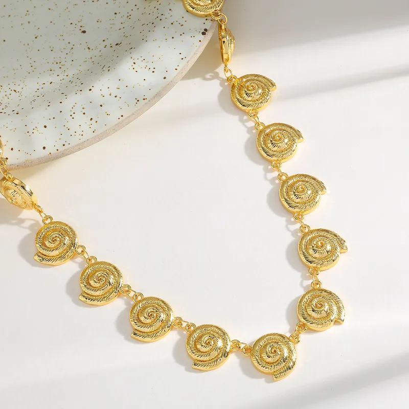 Set de Collar y pulsera  Dorado Espiral