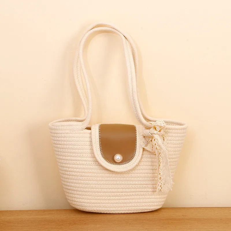 Bolso tejido beige