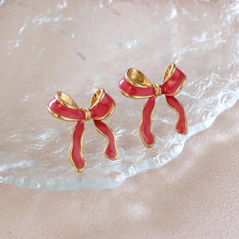 Aretes de lazo rosa