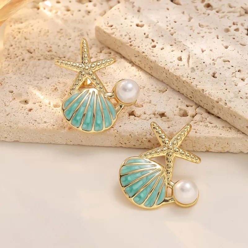 Aretes de estrella de mar y concha