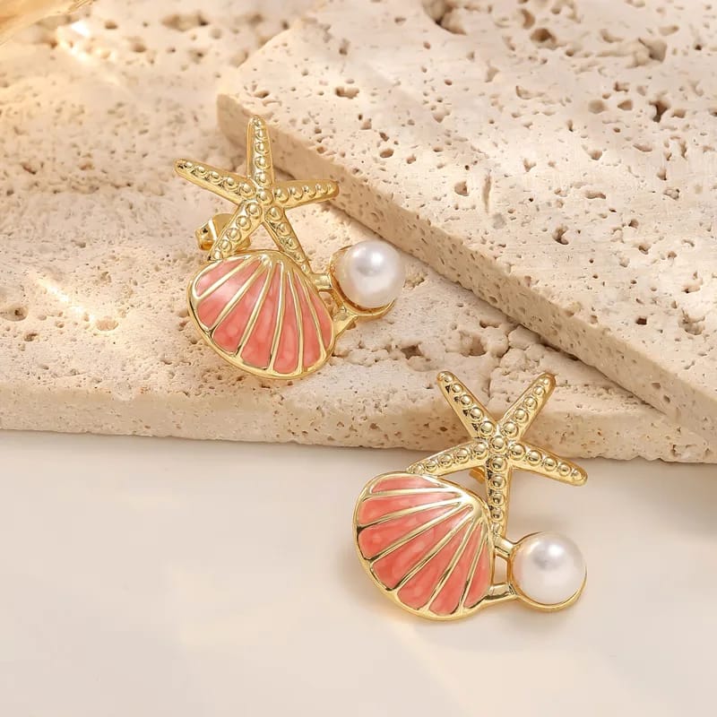 Aretes de estrella de mar y concha