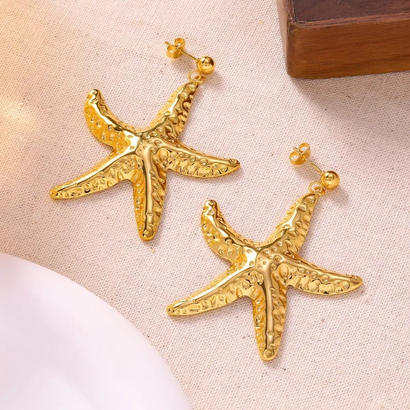 Aretes de estrella de mar dorados