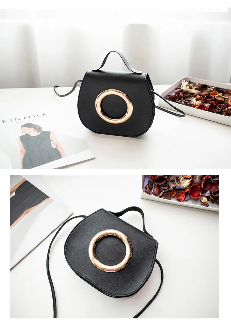 Bolso de mano negro y rojo con aro dorado