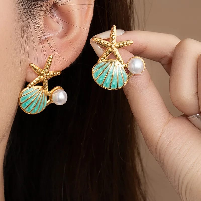 Aretes de estrella de mar y concha