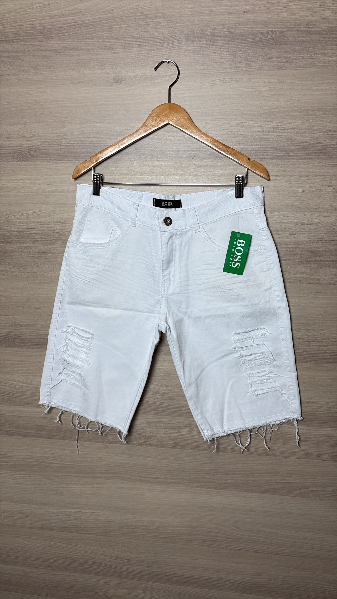 Bermuda Jeans rasgada 