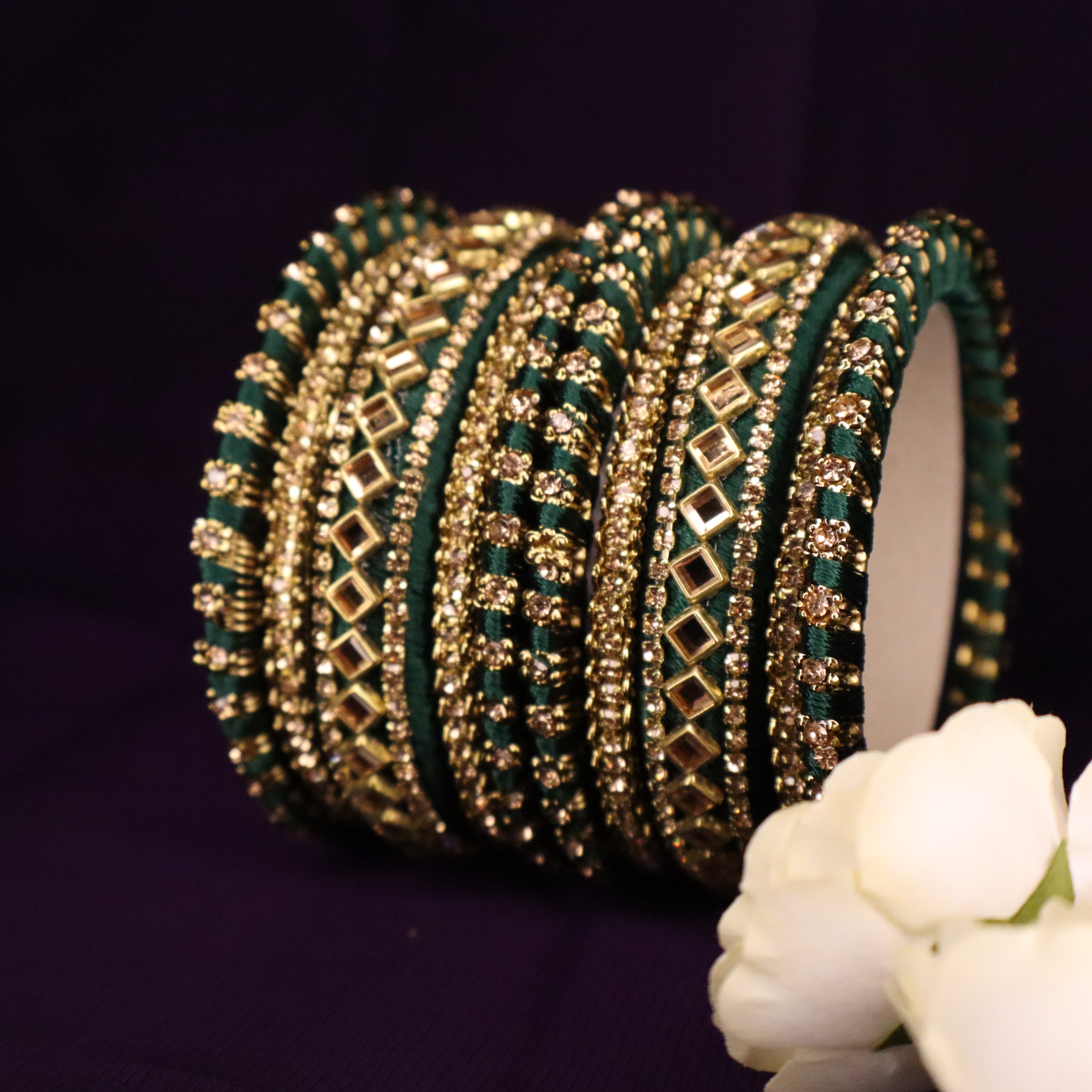 Designer silk threaded Bangles in Bottle green colour