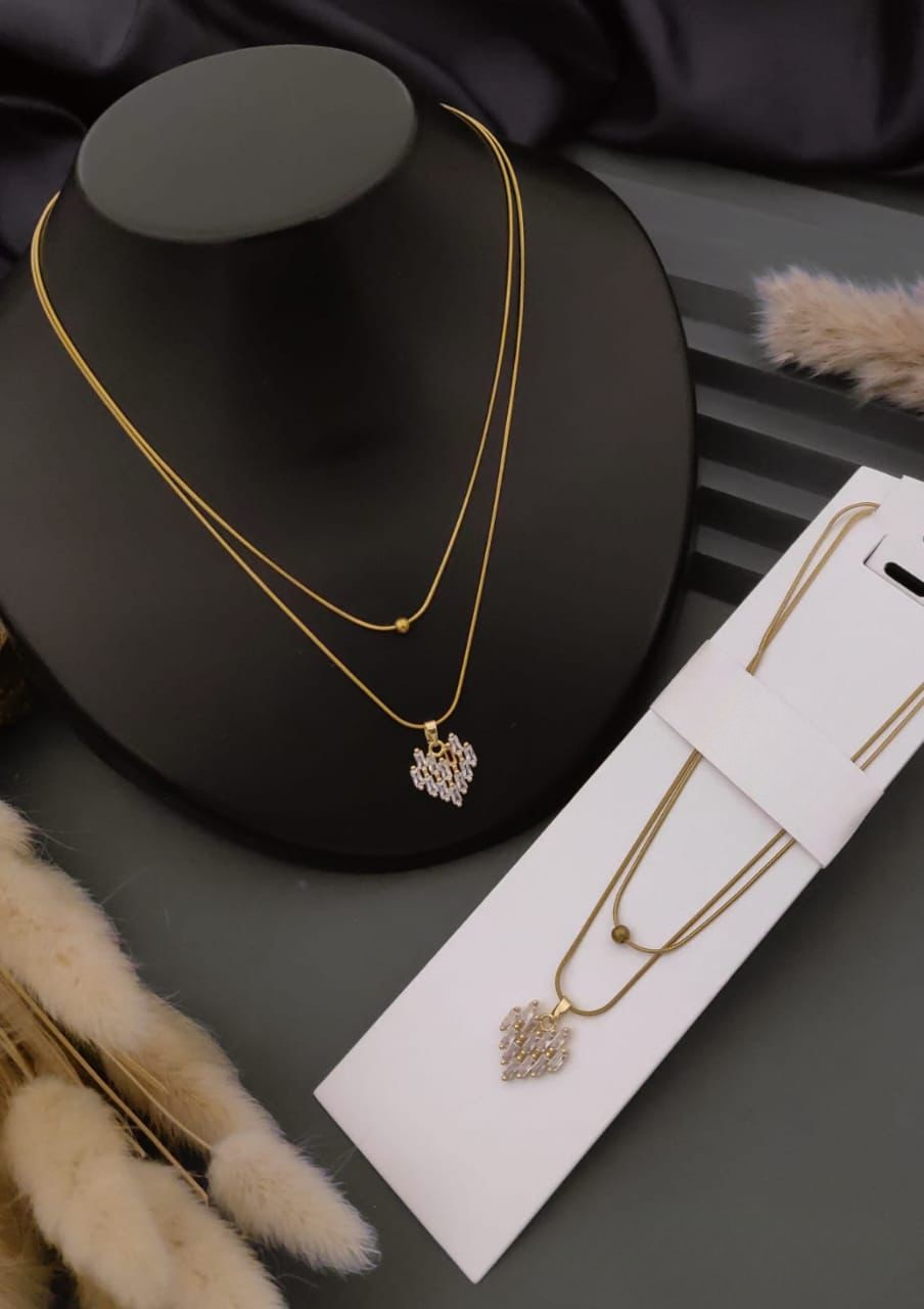 Layered Gold Necklace with Heart Pendant