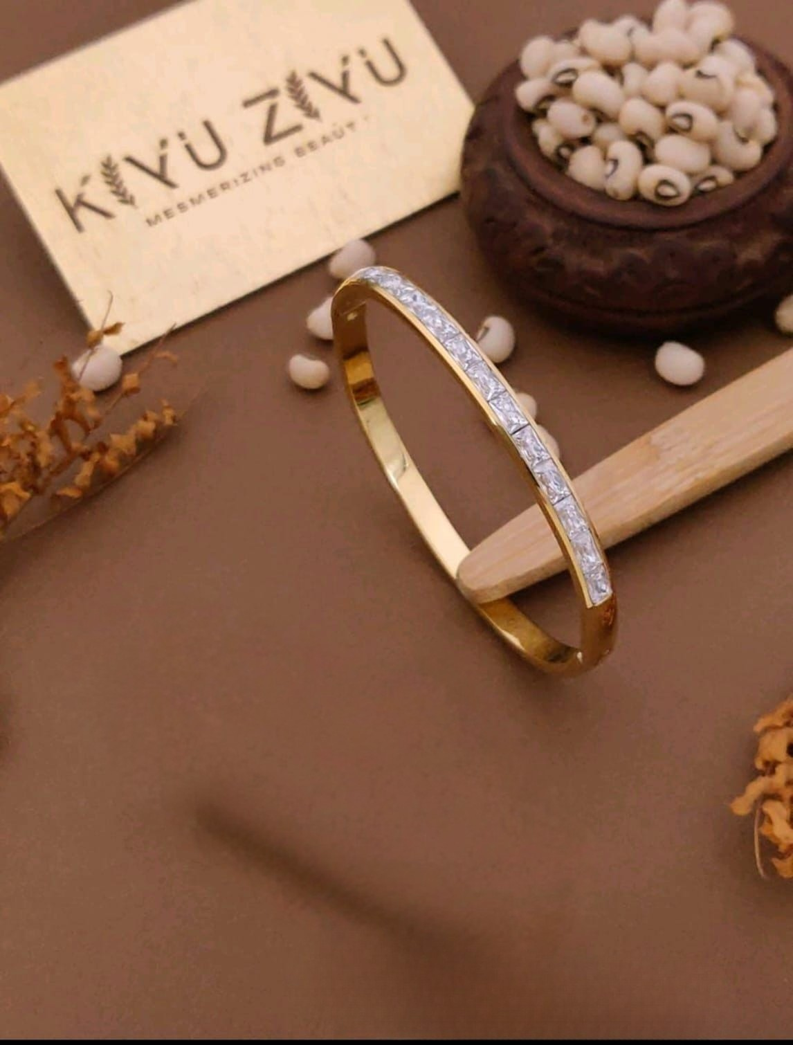 Elegant Stone-Studded Gold Bangle