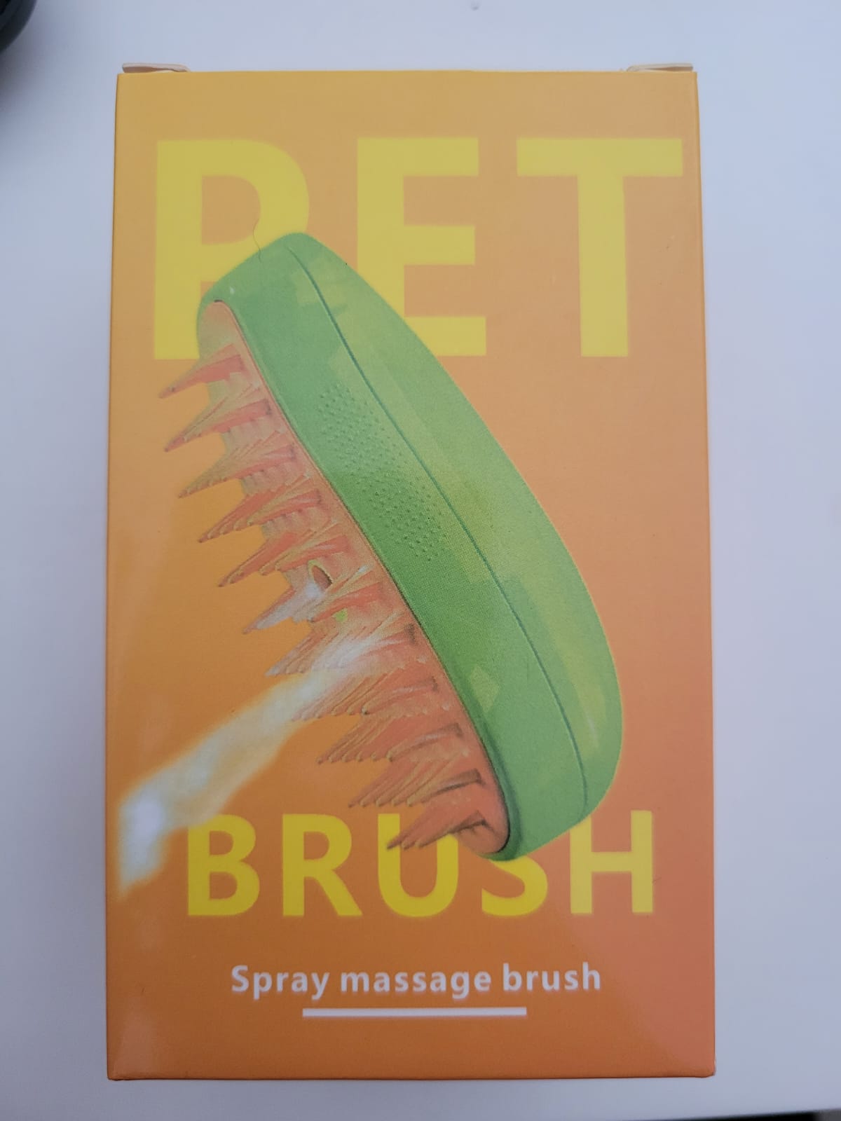 Cepillo vaporizador-masajeador para mascotas