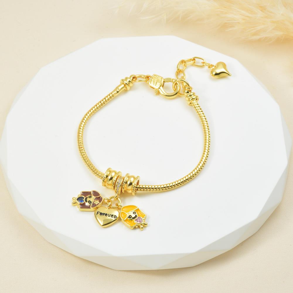 Pulsera de oro con dijes