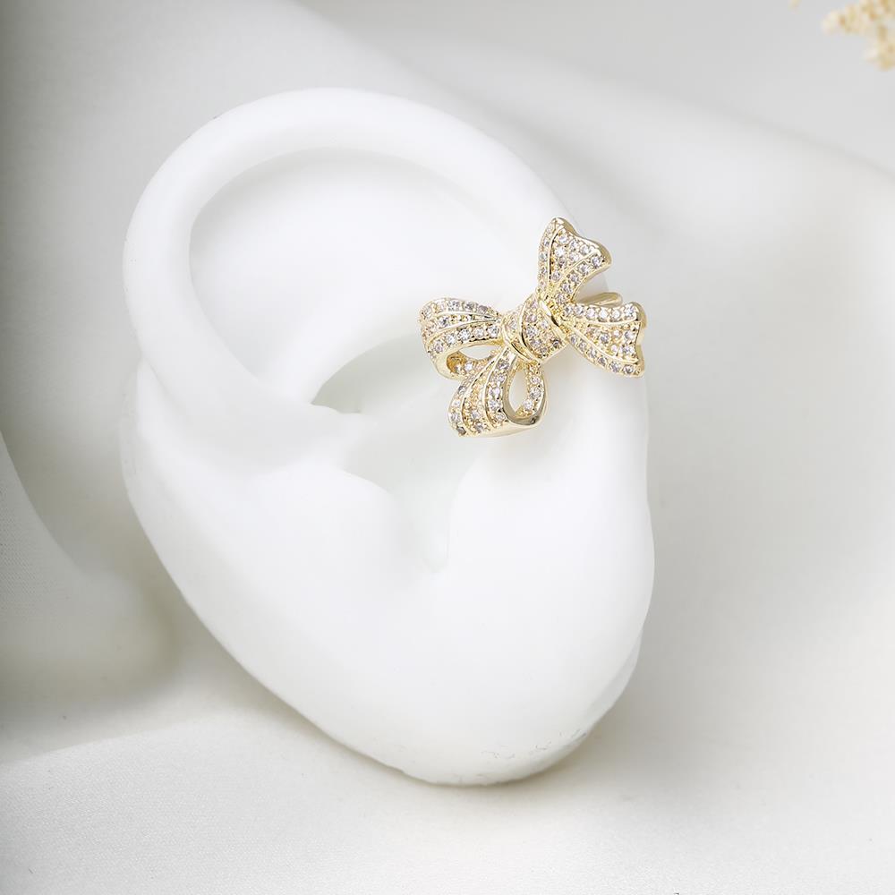 Arete de lazo dorado