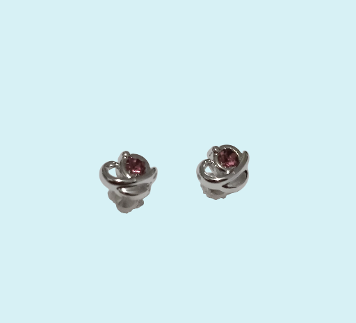 Boucles d’oreilles argentées et pierre rose en plastique