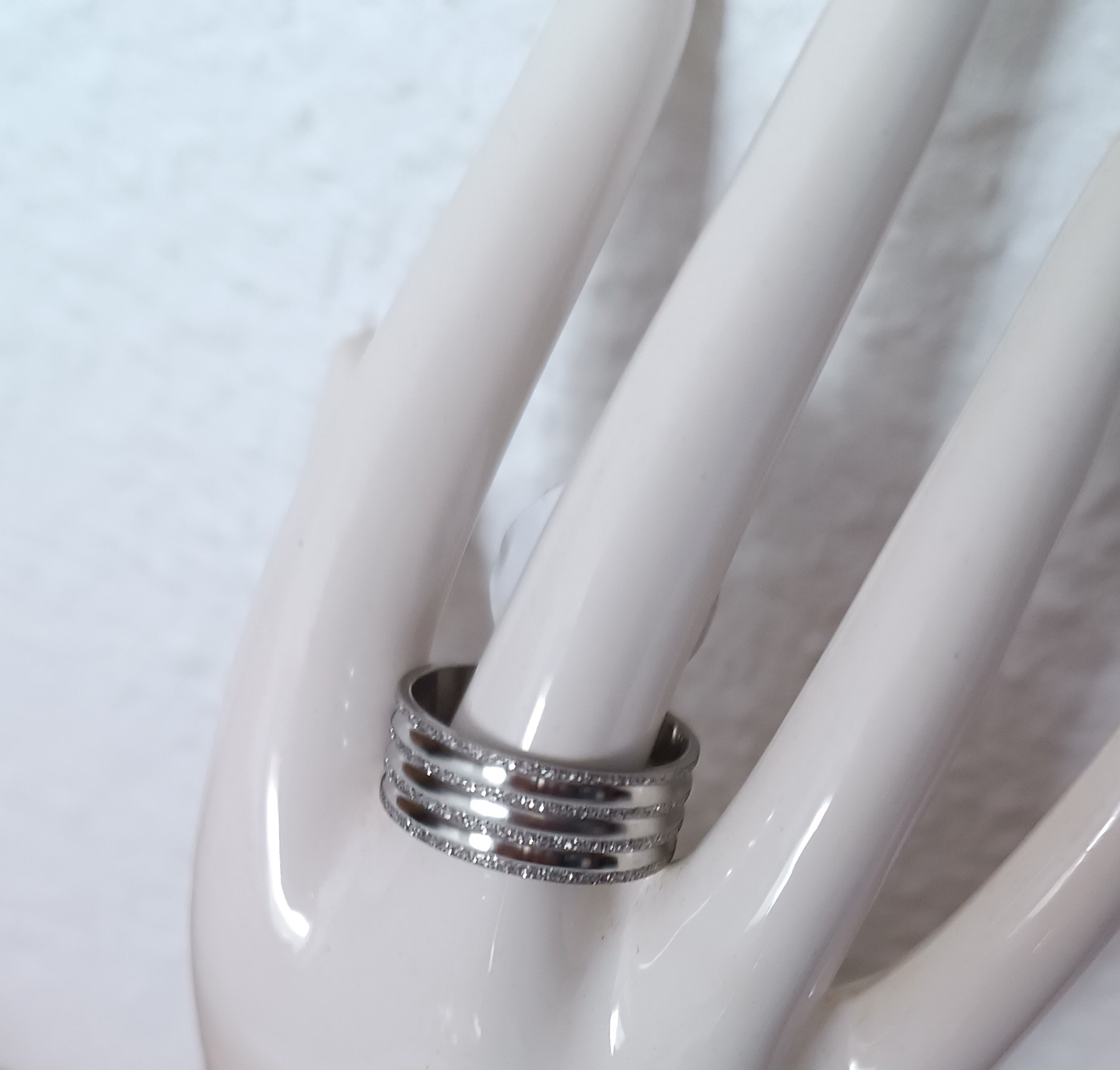 Bague 4 bandes argentées en acier inoxydable