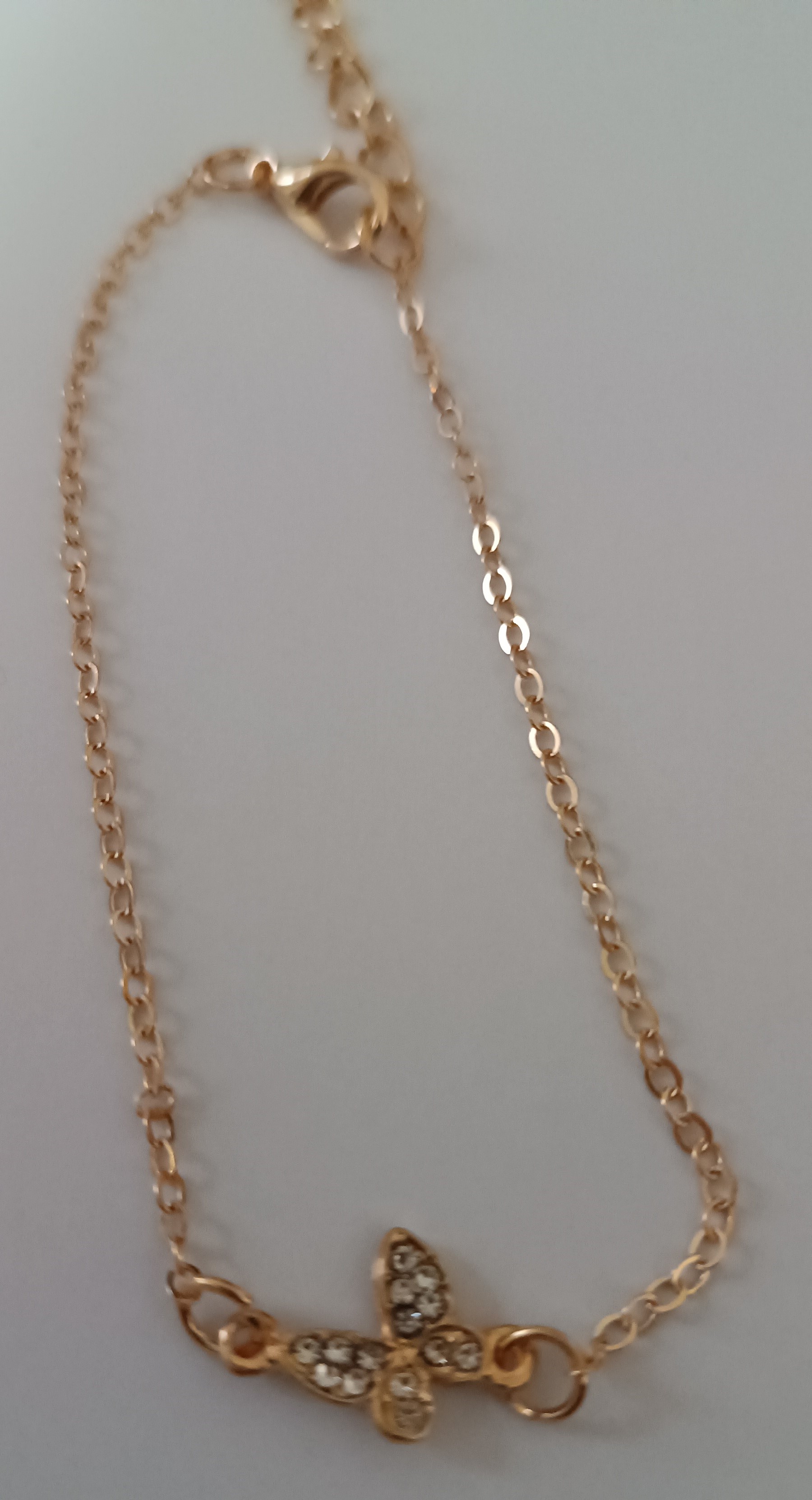 Bracelet papillon doré et strass