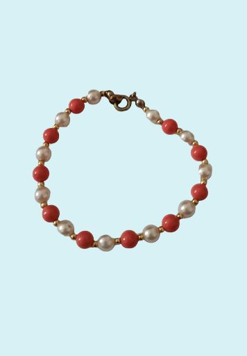 Bracelet perles couleur corail et ivoire