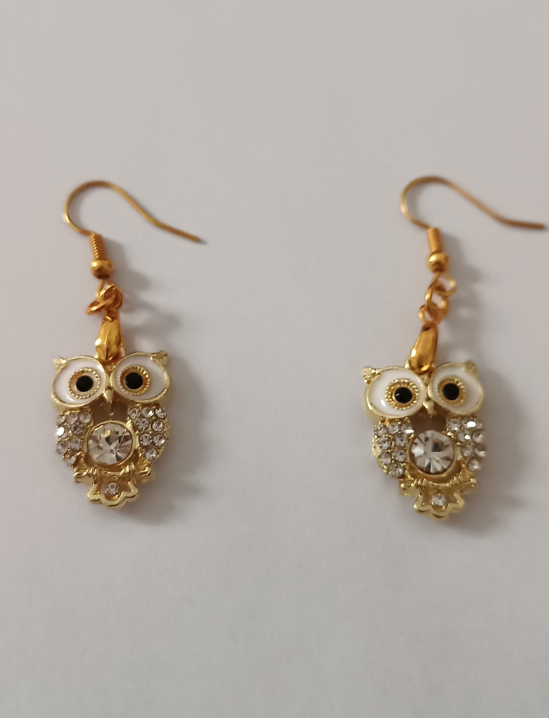 Boucles d’oreilles hibou dorées avec strass