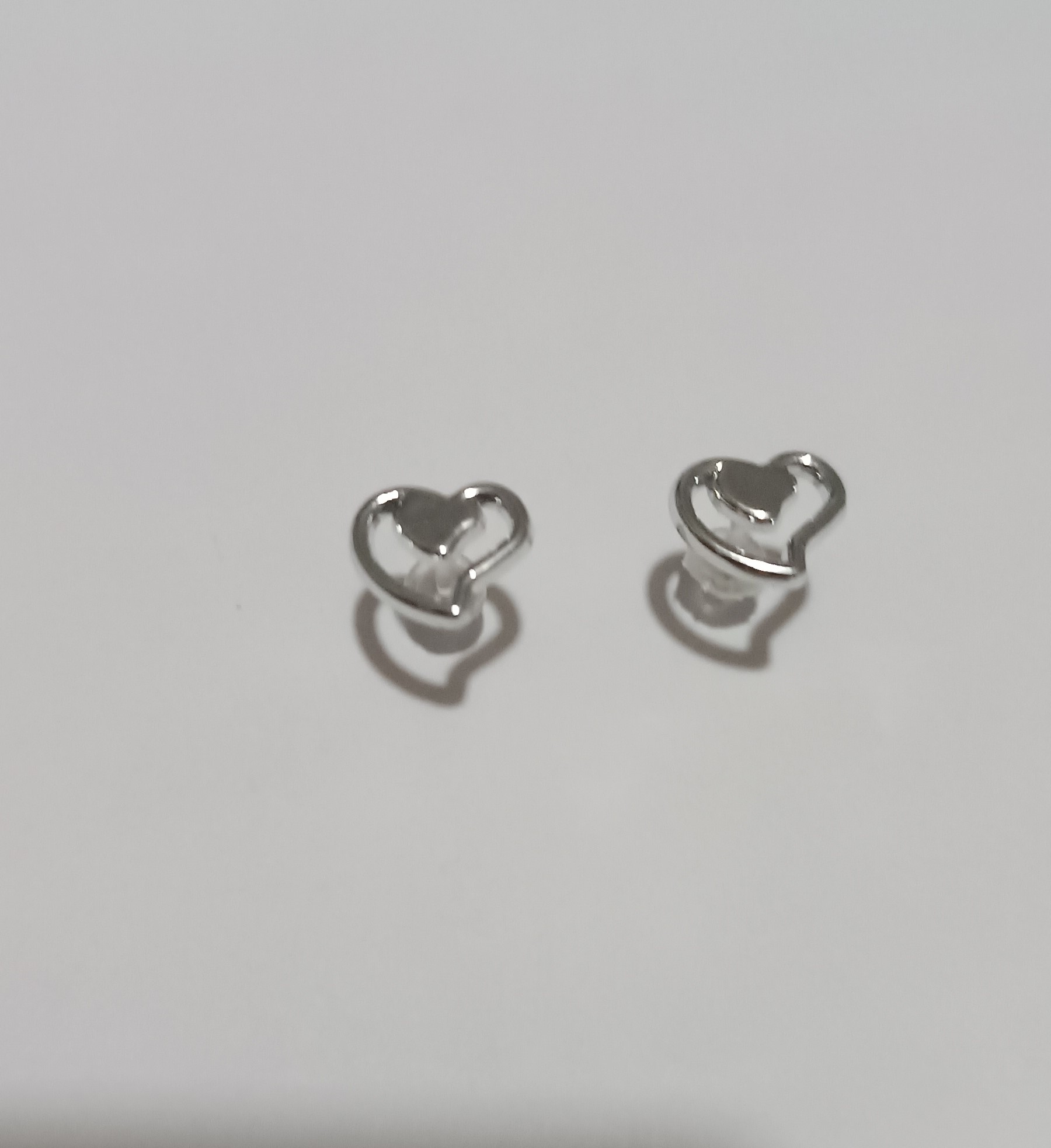 Boucles d'oreilles cœurs argentées