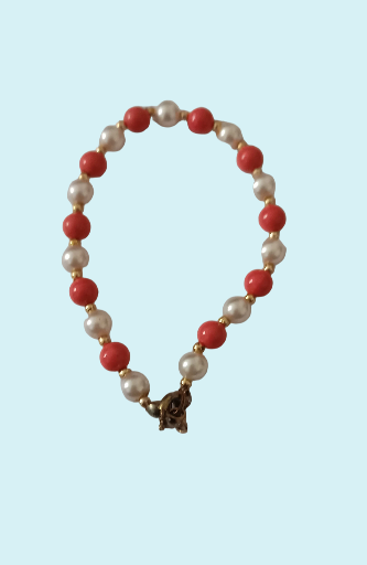 Bracelet perles couleur corail et ivoire