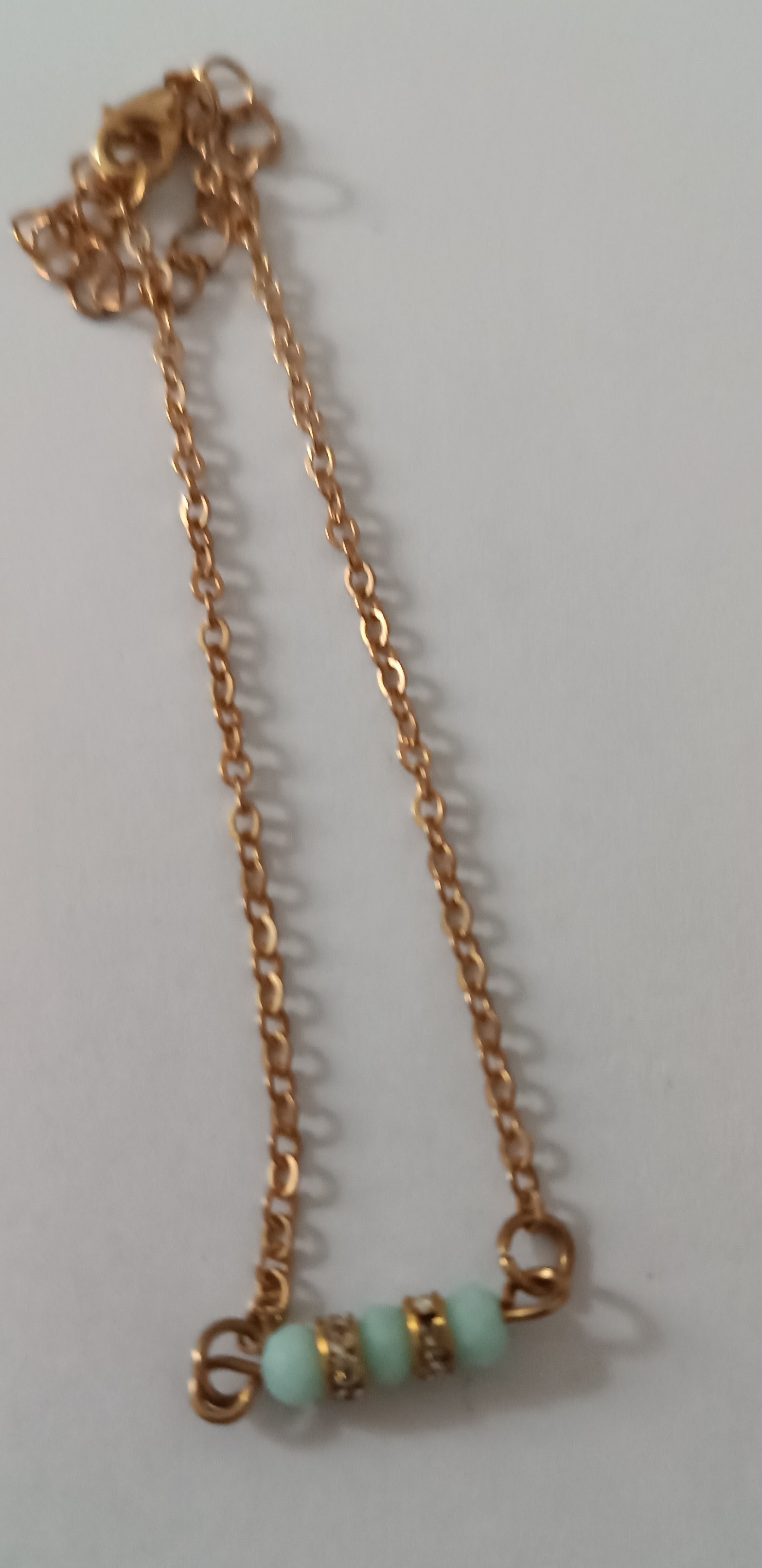 Bracelet doré perles turquoise et strass