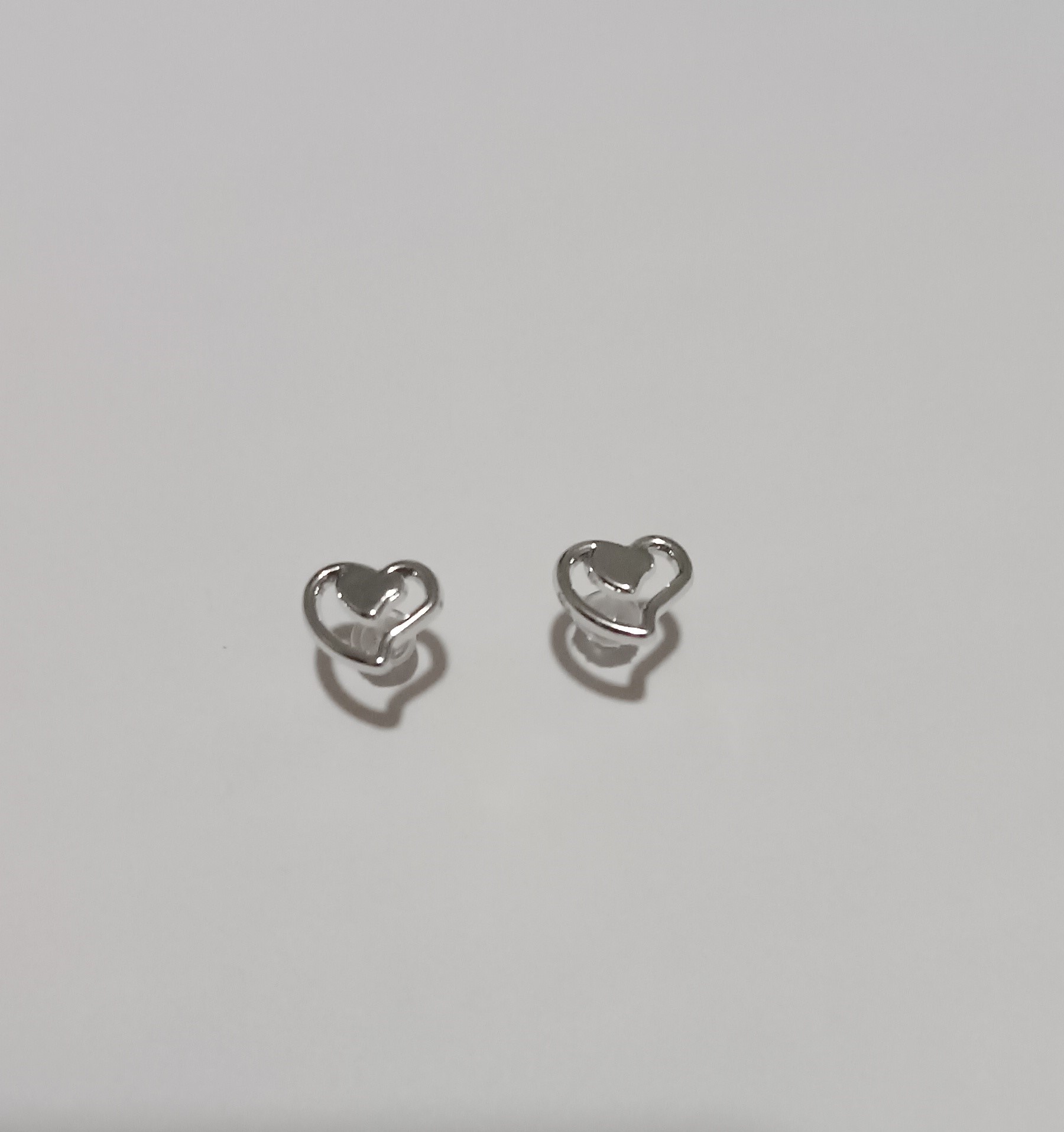 Boucles d'oreilles cœurs argentées