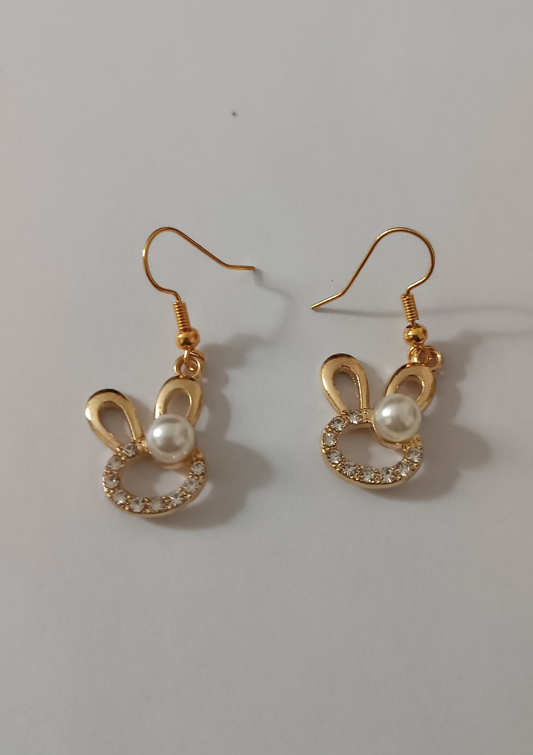 Boucles d'oreilles lapin dorées avec strass et perle