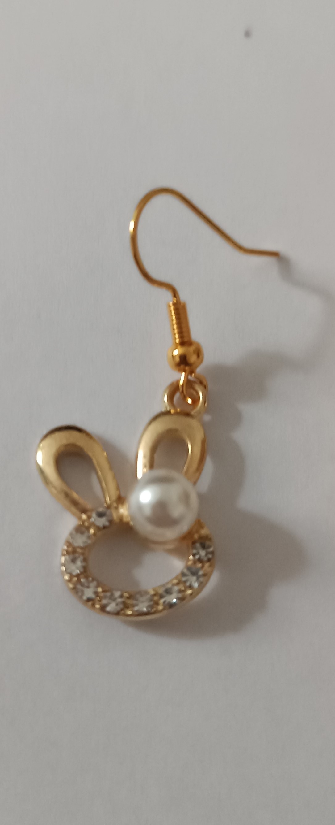 Boucles d'oreilles lapin dorées avec strass et perle