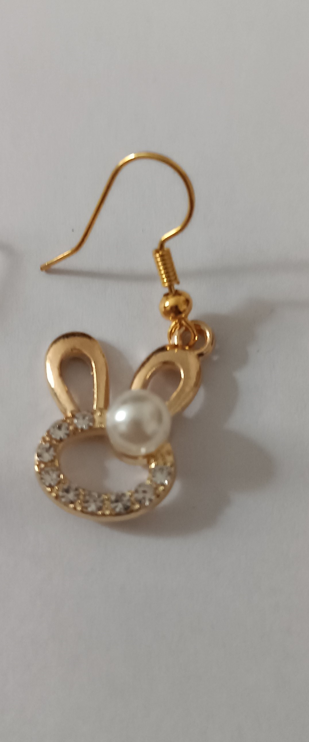 Boucles d'oreilles lapin dorées avec strass et perle