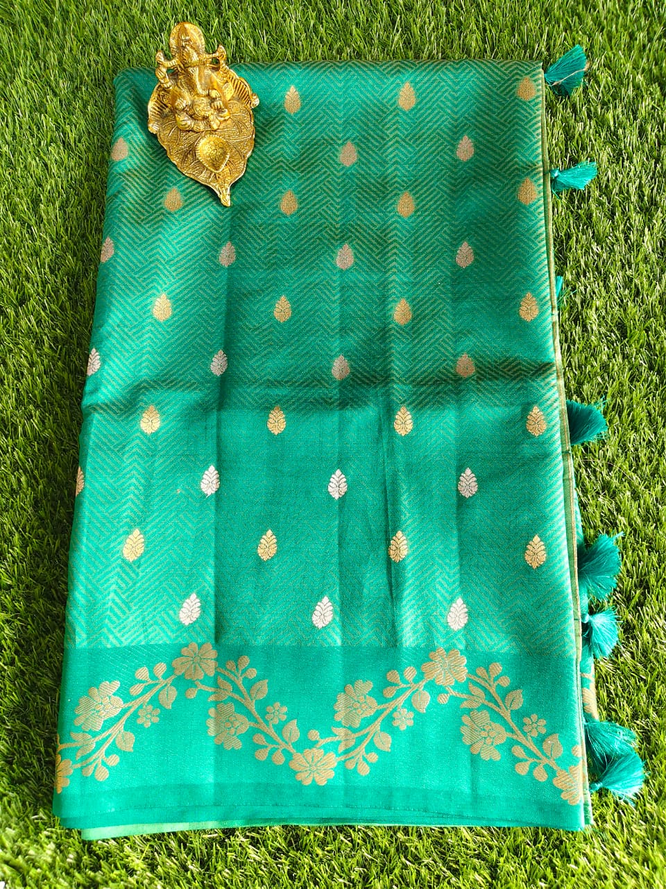 Emerald Green Tussar Silk Saree with Allover Zari Buta Weaving and Floral Border