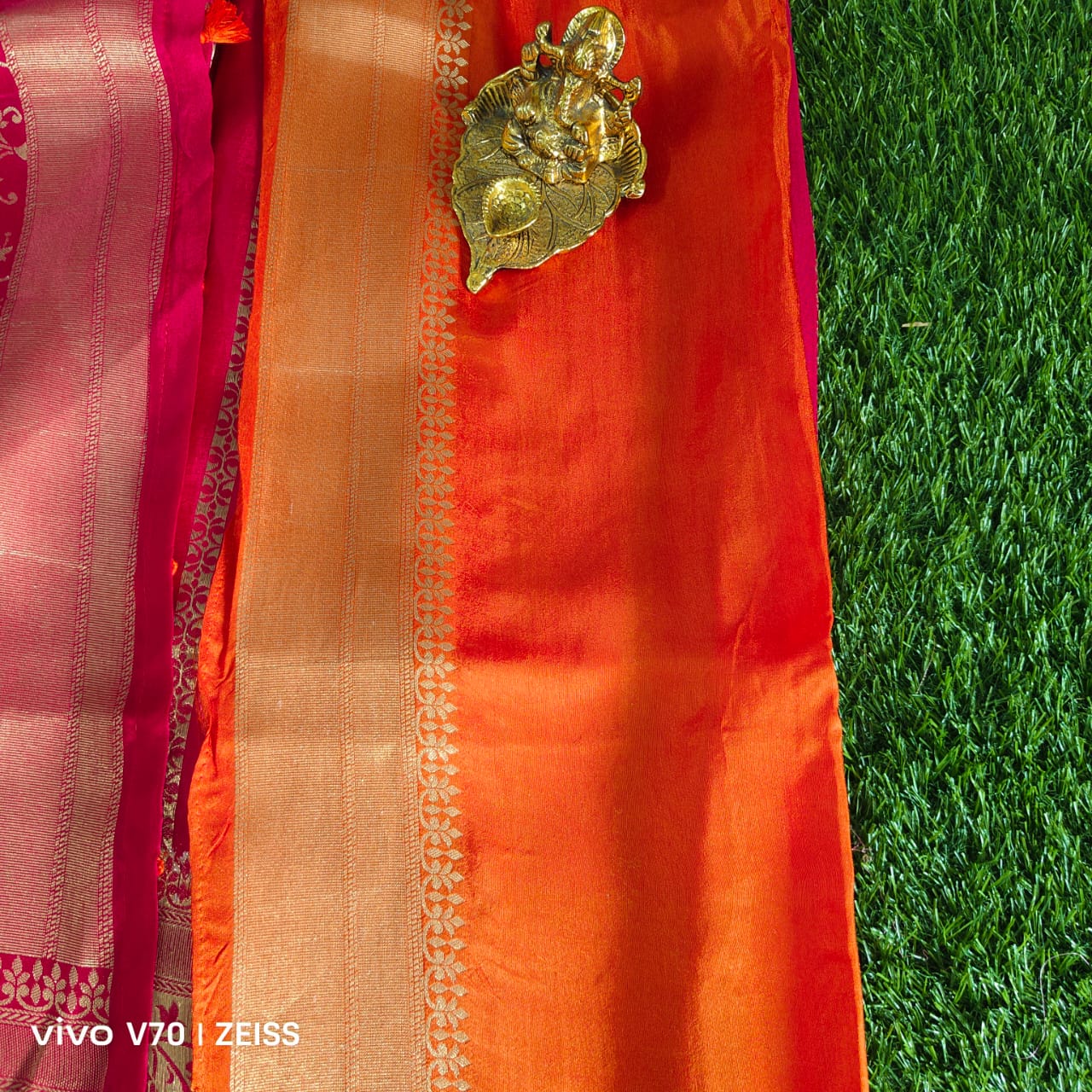 Pink Dola Silk Saree with Gold Zari Stripe Weaving and Floral Border with Orange Blouse