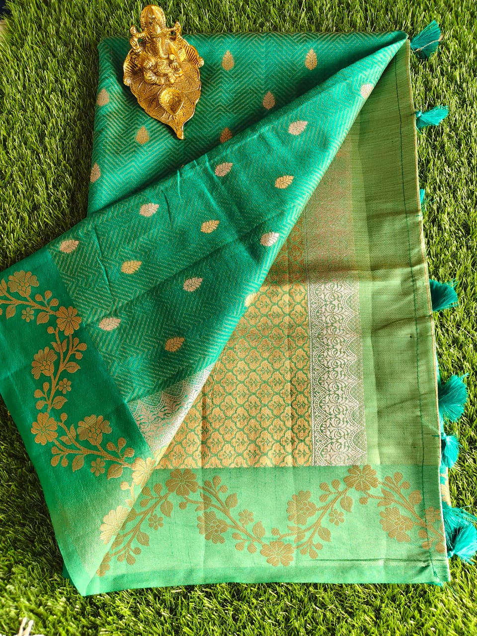 Emerald Green Tussar Silk Saree with Allover Zari Buta Weaving and Floral Border