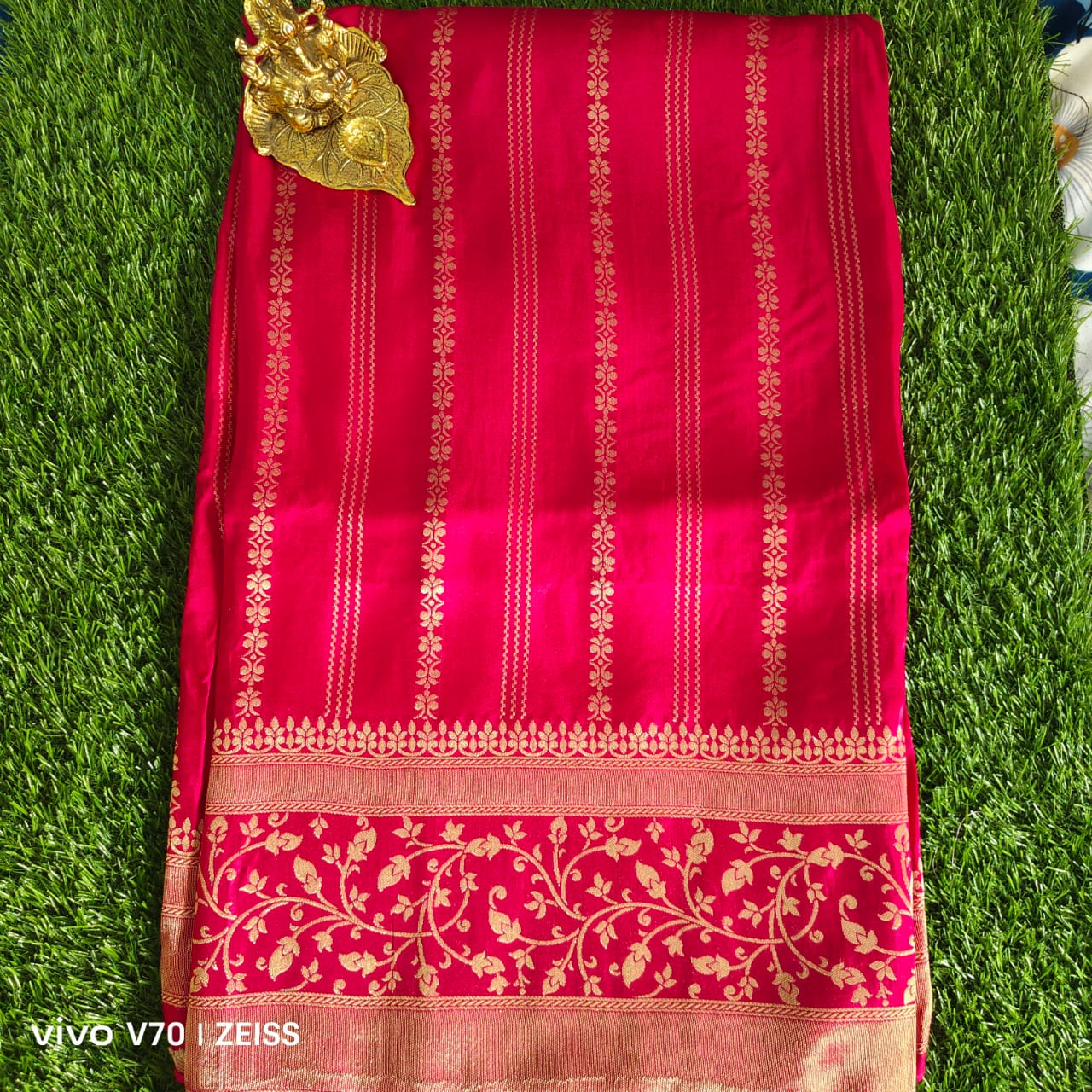 Pink Dola Silk Saree with Gold Zari Stripe Weaving and Floral Border with Orange Blouse