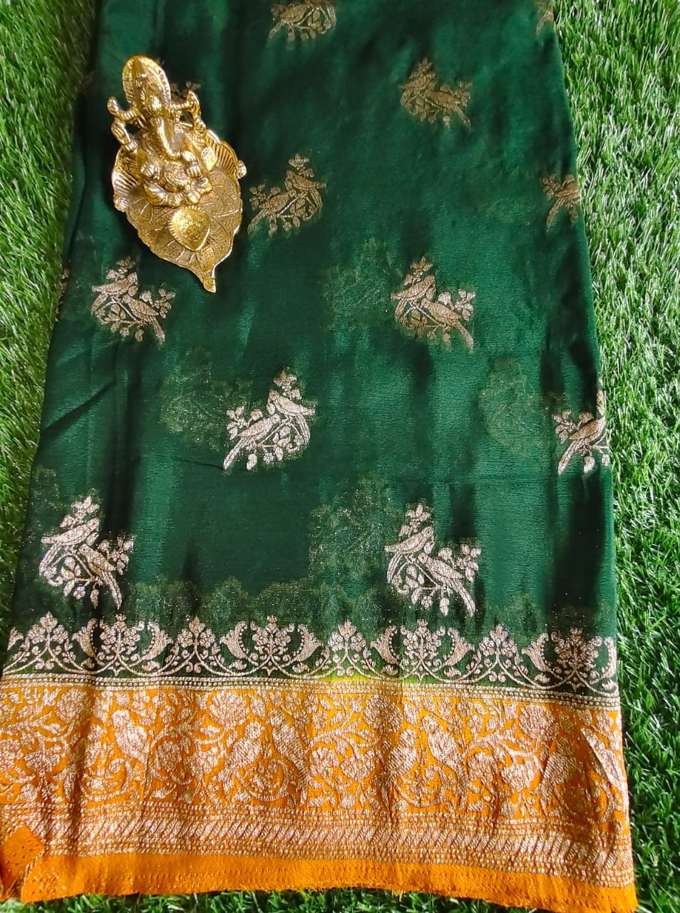 Classic Bottle Green Khaddi Georgette Saree with Yellow Contrast Border and Parrot Motifs