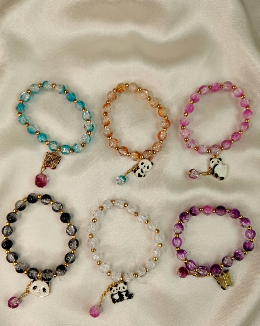 Whimsical Wonders: Crackle Crystal Charm Bracelet Collection