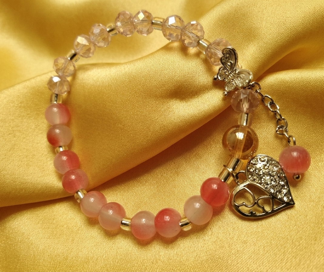 Ethereal Grace: Blush & Crystal Charm Bracelet
