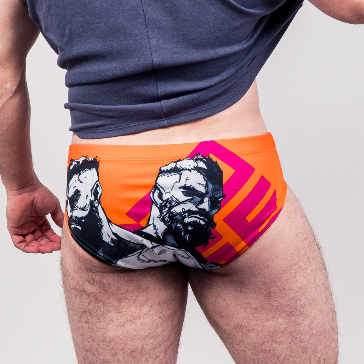 Men’s "ORANGE" Graphic Swim Briefs – FACES Edition
