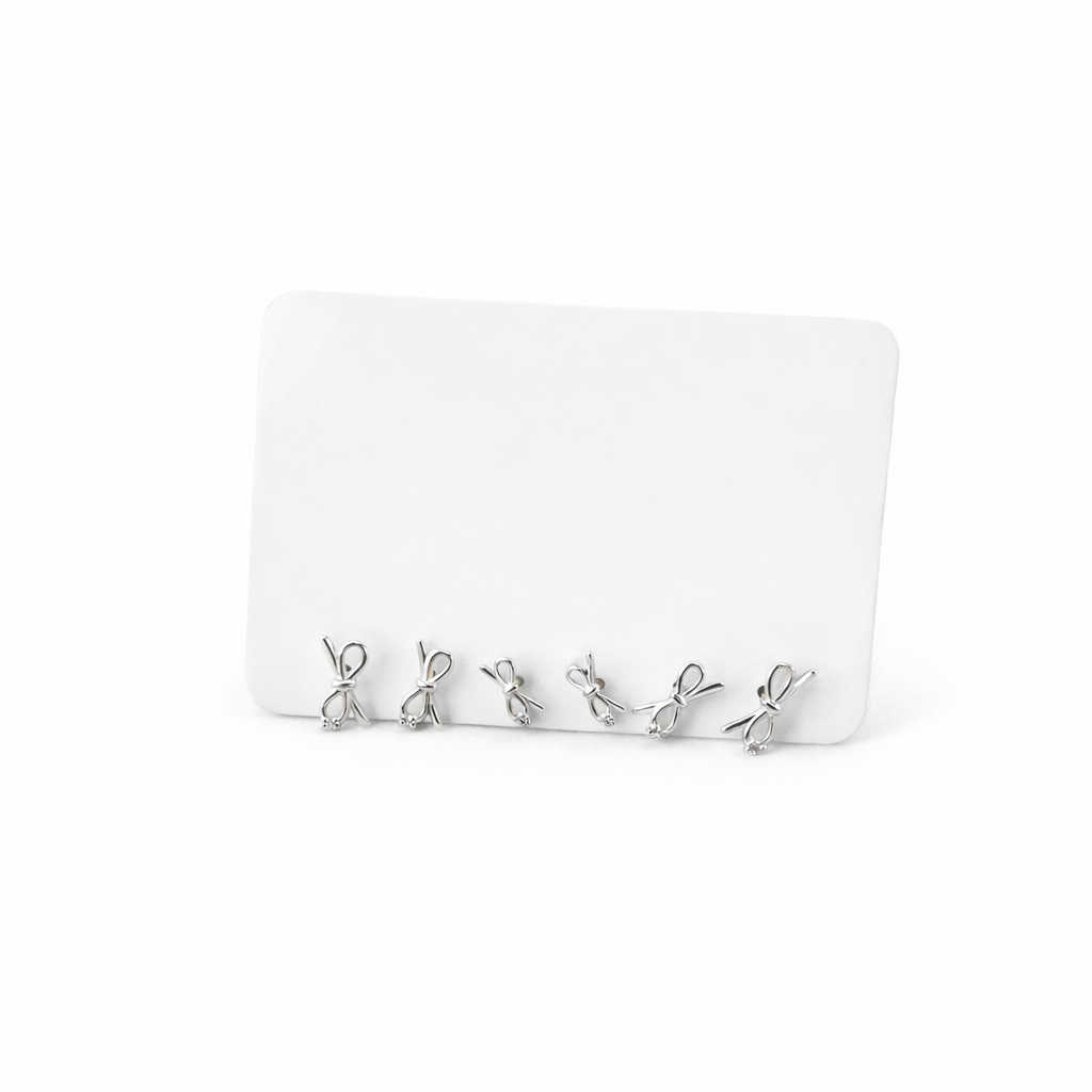 Brincos Prateados Laço