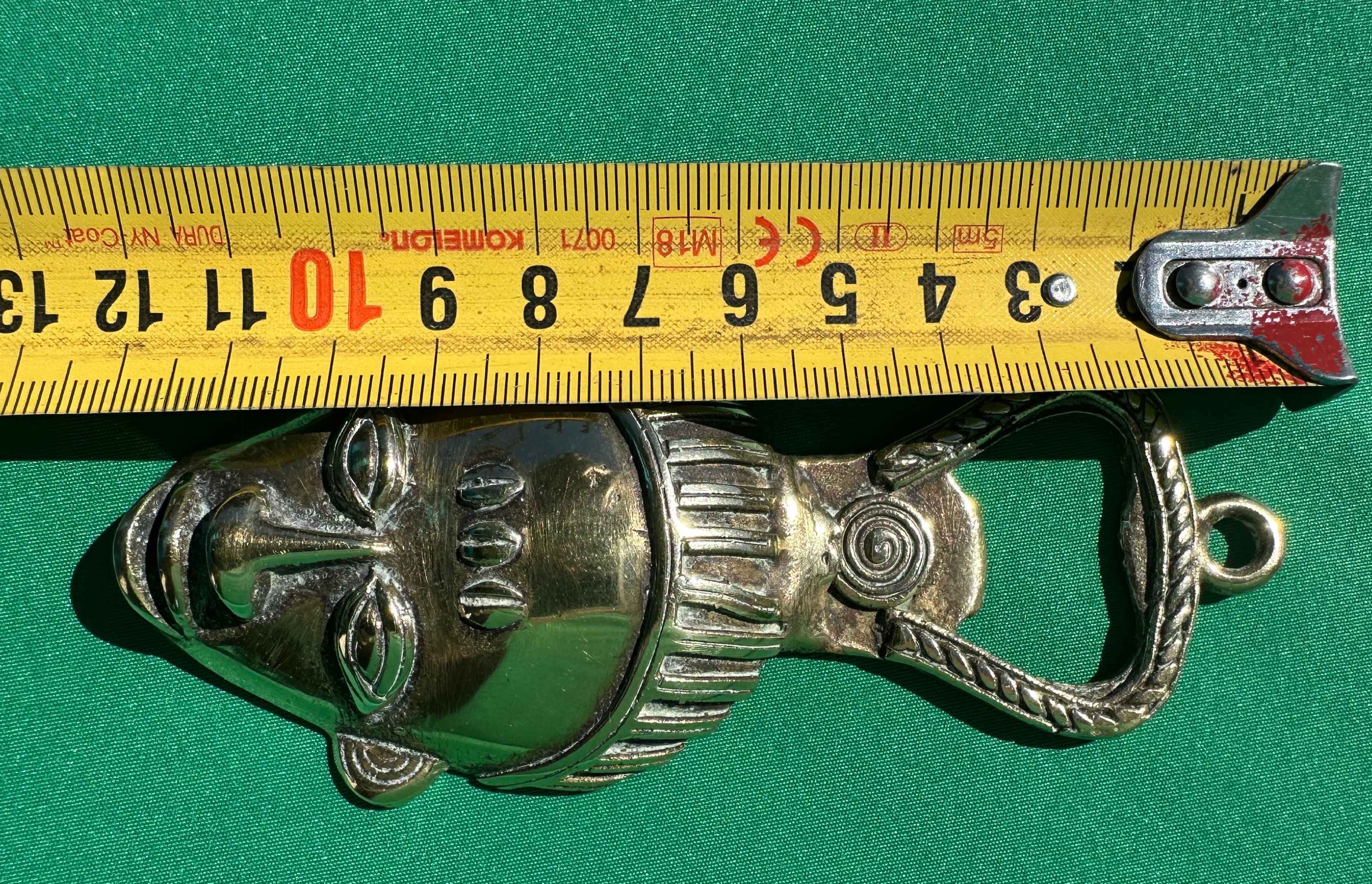 Décapsuleur en forme de visage