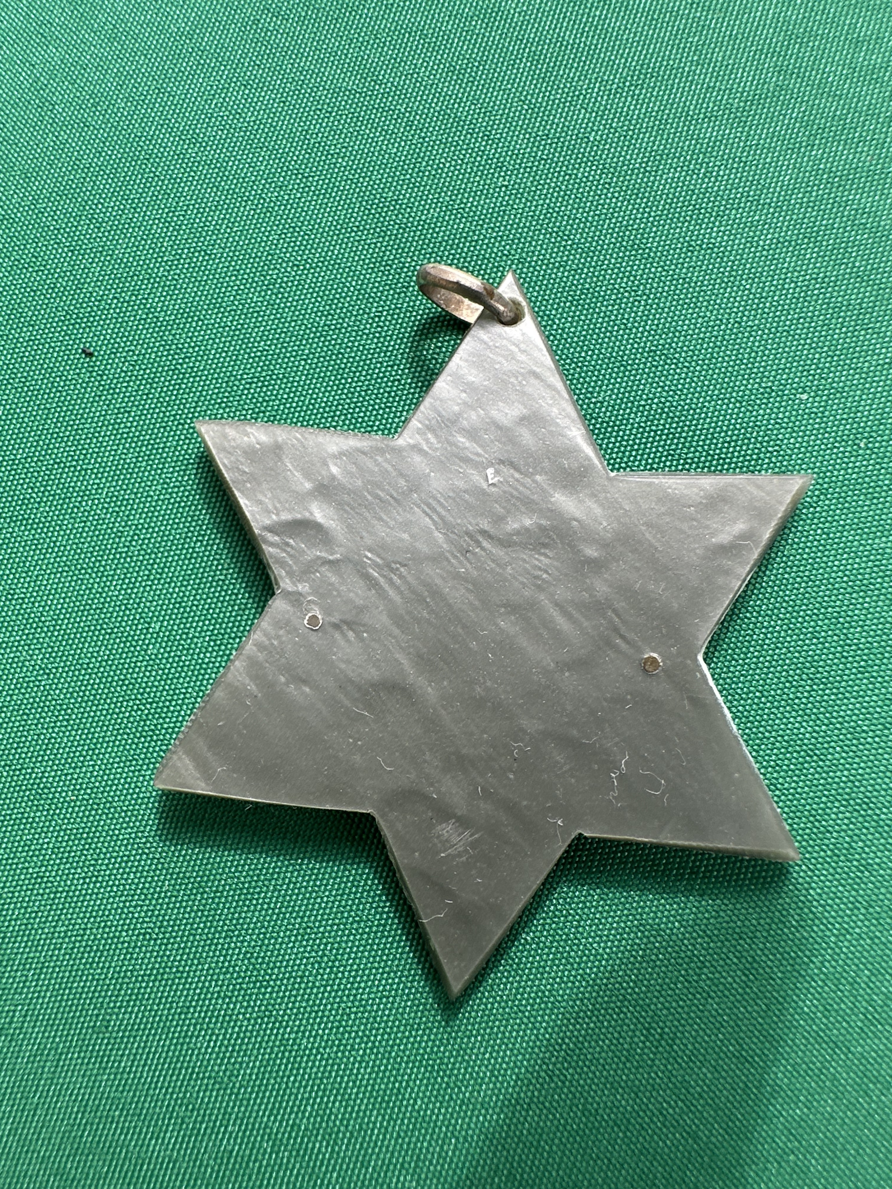 Médaille religieuse en étoile